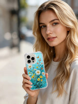 PhoneCasing soft coastal breeze art on an iPhone 16 Pro Max Case, featuring delicate daisies and butterflies in a peaceful seaside palette.