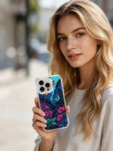 PhoneCasing turquoise sky butterfly art on an iPhone 16 Pro Max Case, with bright butterflies soaring above a dark, enchanted floral canyon.