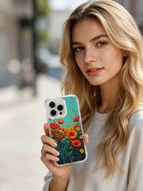 Turquoise-sky floral border on an iPhone 16 Pro Max case