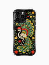 Colorful folk art skeleton peacock artwork on this PhoneCasing iPhone 16 pro max case, featuring a peacock skeleton surrounded by roses and hearts.