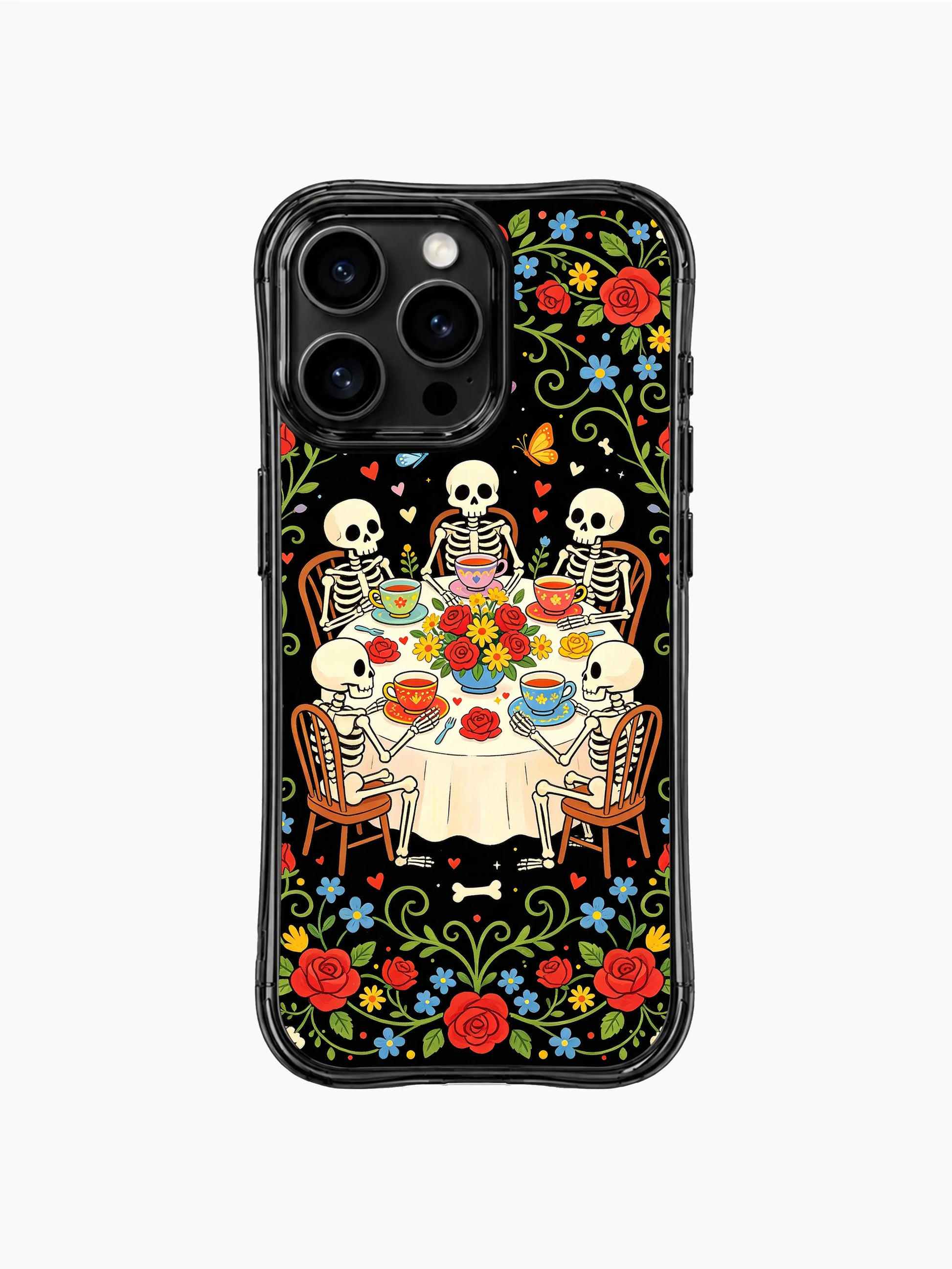 Colorful folk art skeleton gathering artwork on this PhoneCasing iPhone 16 pro max case, featuring skeletons sharing tea surrounded by roses and daisies.