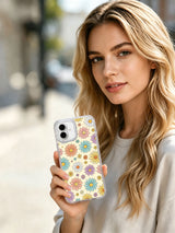 Macro shot crystal rhinestone camera bezel detail on Cream Color Daisy Parade iPhone 16 pro max casing, scratch-resistant protective PhoneCasing shell built for iPhone 16 pro max.