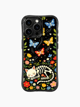 Whimsical sleeping skeleton cat with bone butterflies on this PhoneCasing iPhone 16 pro max case, folk art style with vibrant blooms and colorful patterns.