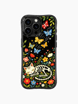 PhoneCasing iPhone 16 pro max case featuring a sleeping skeleton cat with bone butterflies, whimsical folk art design with colorful flowers on black background.