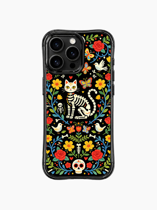 PhoneCasing iPhone 16 pro max case featuring a whimsical sugar skull cat surrounded by colorful folk art flowers, butterflies, and birds on black background.