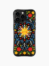 PhoneCasing iPhone 16 pro max case featuring a whimsical folk art sun surrounded by dancing skeletons, colorful flowers, and hearts on black background.