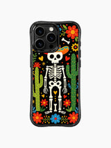 Desert Day of the Dead skeleton design on PhoneCasing iPhone 16 pro max case, featuring a sombrero skeleton with cacti and blue flowers.