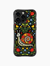 Folk art skeleton snail with Day of the Dead motifs on PhoneCasing iPhone 16 pro max case, surrounded by roses, hearts, and wildflowers.