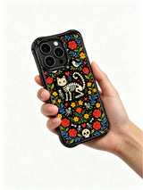 Gothic folk art skeleton cat with bones and flowers on PhoneCasing iPhone 16 pro max case, vibrant design with hearts and butterflies.