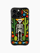 Night desert skeleton design on this PhoneCasing iPhone 16 pro max case, featuring a sombrero skeleton surrounded by cacti and colorful flowers.