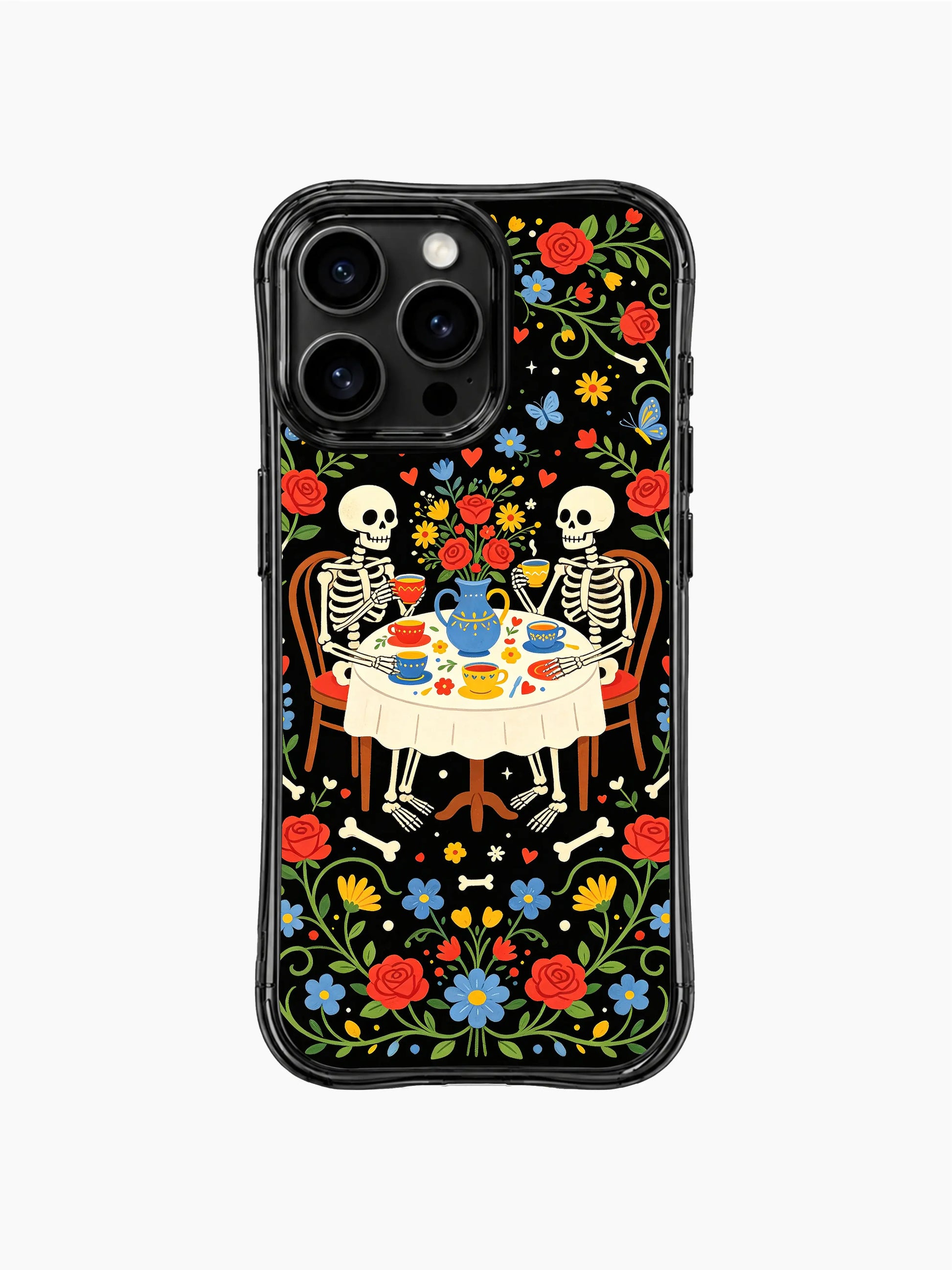 Skeleton tea party in a flower-filled midnight garden on this PhoneCasing iPhone 16 pro max case, featuring roses, daisies and playful skeletons.