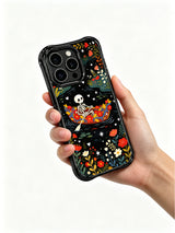 Whimsical skeleton in a floral boat design on PhoneCasing iPhone 16 pro max case, featuring stars and hearts on a dark background.