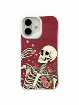 Skeleton with wind-blown petals on an iPhone 16 case