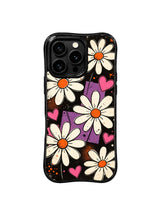 PhoneCasing iPhone 16 pro Case with matte purple geometric block accents across black backdrop, playful Ruby Daze Midnight Daisy Pulse floral design, stylish women’s wavy phone casing.