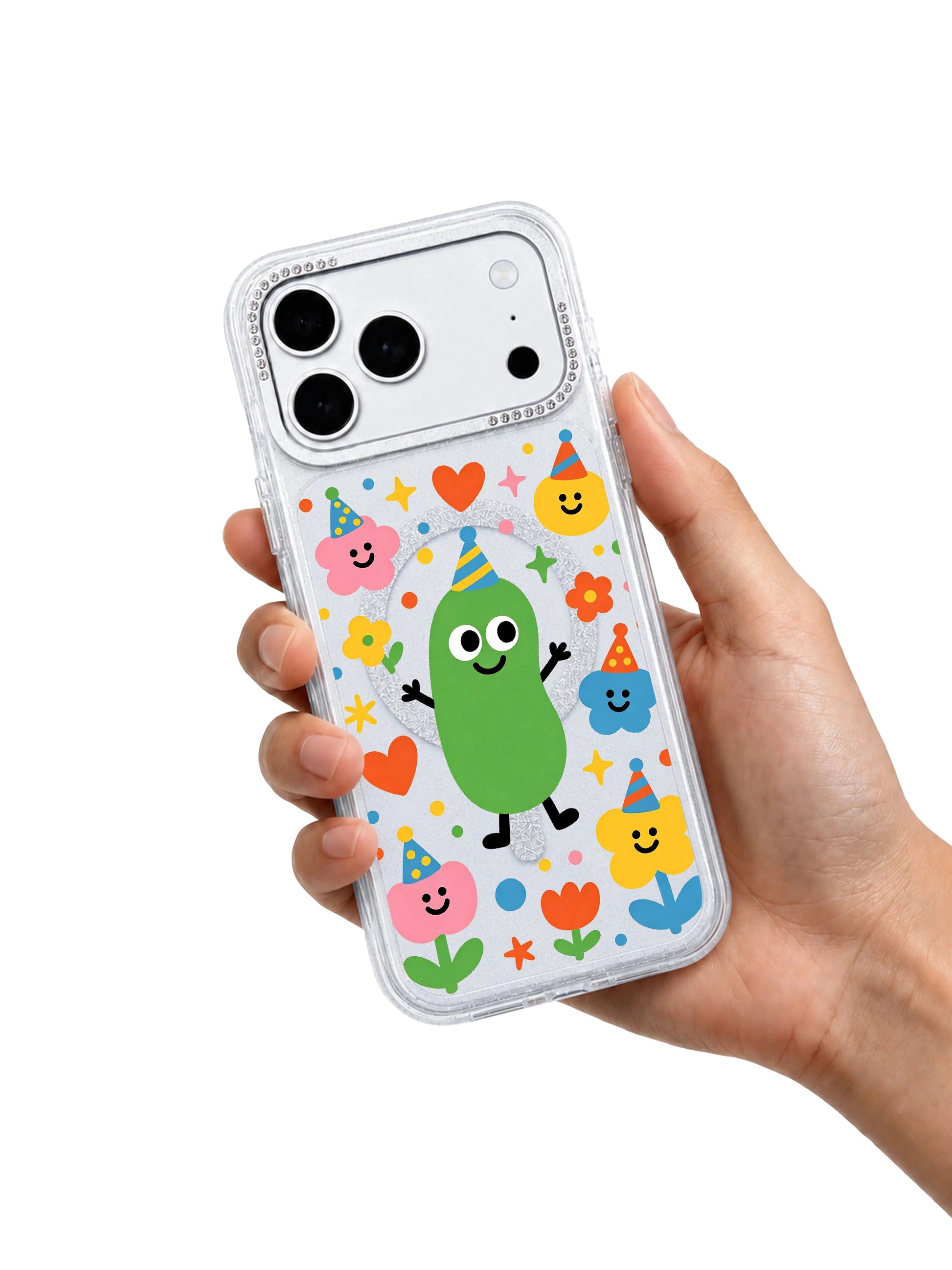 PhoneCasing character macro shot of the grinning party-hatted pickle host from the Spring series on Smiling Pickle Host iPhone 17 Pro Max case, Milo Popkins signature playful doodle aesthetic on the iPhone 17 Pro Max casing