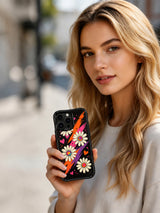 PhoneCasing iPhone 16 pro Case with subtle tiny heart night symbol doodle accents scattered across midnight daisy field, part of Ruby Daze’s Velvet Wave Blossoms Collection, UV-printed wavy art casing.