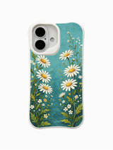 PhoneCasing exclusive artist collaboration iPhone 16 Plus Case, featuring Mira Bloomwell’s Fairy Daisy Path with a dreamy flower-lined trail against a teal sky.