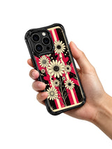 PhoneCasing iPhone 16 pro Case with deep matte black canvas layered worn cherry red faded vertical stripes and rhythm spaced vintage cream daisies, Ruby Daze Black Cherry Daisy Beat artist-designed wavy casing for self-assured feminine style.