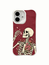 Old-school tattoo-style Petal Letter skeleton on an iPhone 16 case