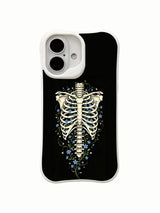 PhoneCasing old school tattoo Star Blossom In Bone black background rib skeleton iPhone 16 Case, deep black vintage wash bone & blue flower artwork, California manufactured shockproof iPhone 16 casing