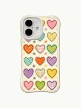 Polka Dot Whimsy heart pattern on an iPhone 16 Plus case