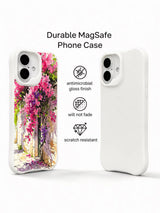 Pink and purple floral artwork on an iPhone 16 case