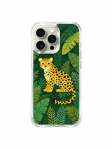 Jungle Stillness: An upright cat between broad diagonal leaves and small fern-like fronds.
