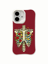 Retro tattoo-style skeleton floral composition on an iPhone 16 case
