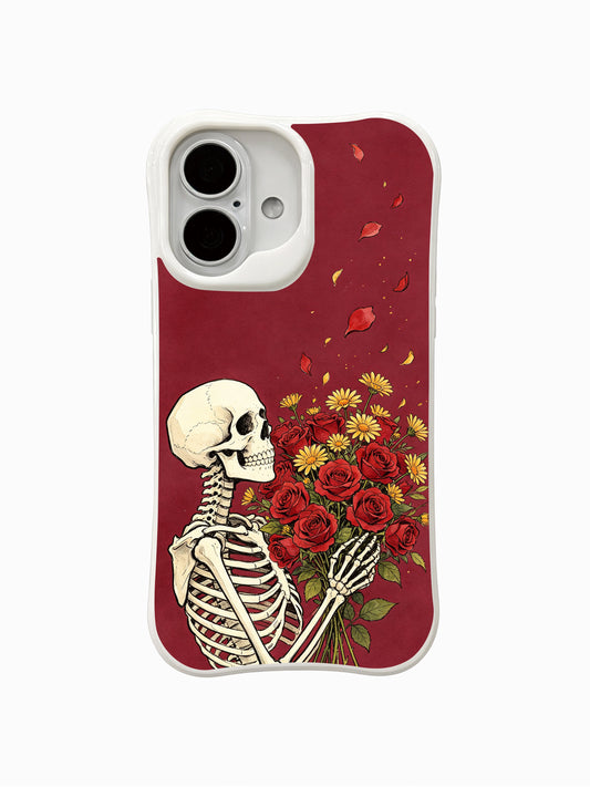 PhoneCasing Rose For The Wind fine art iPhone 16 Case, vintage old-school tattoo goth artwork designed by Morrigan Vale featuring skeleton holding red rose bouquet with drifting falling petals