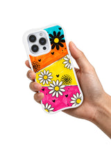PhoneCasing iPhone 16 pro Case with bright multi-hued slanted color block canvas layered thick hand-drawn black marker daisy silhouettes, Ruby Daze Daisy Love Carnival artist-designed wavy casing for bold expressive feminine style.