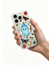 Wisp with side crescent, lower butterfly and sparkles artwork on an iPhone 15 Pro case