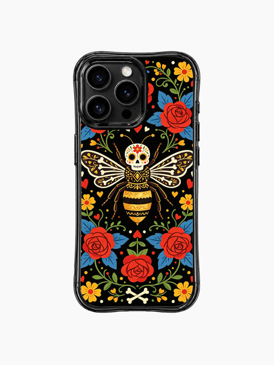 PhoneCasing iPhone 16 pro max case featuring a Day of the Dead skeleton bee queen design by Estrella Nocturna. Vibrant folk art print with red roses and sugar skull details.