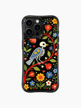 PhoneCasing iPhone 16 pro max Case with a skeleton bird framed by a winding red floral branch, surrounded by bright folk flowers and green leaves, creating a bold folk art print on iPhone 16 pro max casing.