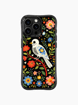 PhoneCasing iPhone 16 pro max Case featuring a skeleton bird surrounded by bold red and yellow folk flowers, with blue accents and green leaves creating a vibrant folk art design for iPhone 16 pro max casing.
