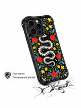 PhoneCasing iPhone 16 pro max Case with a bone snake skeleton coiled into a protective wreath, surrounded by colorful folk flowers and leaves, representing the beauty of life and death, folk art pattern on black iPhone 16 pro max casing.