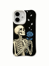 PhoneCasing Soul Stare miracle amid darkness skeleton blue rose iPhone 16 Case, symbolic goth art showing rare glowing blue bloom rising from rigid skeletal palm, MagSafe compatible custom printed iPhone 16 casing