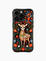 PhoneCasing iPhone 16 pro max Case with a sugar skull deer wearing a green beaded necklace, showing its skeleton body and floral face, surrounded by flowers, whimsical Day of the Dead print on black iPhone 16 pro max casing.