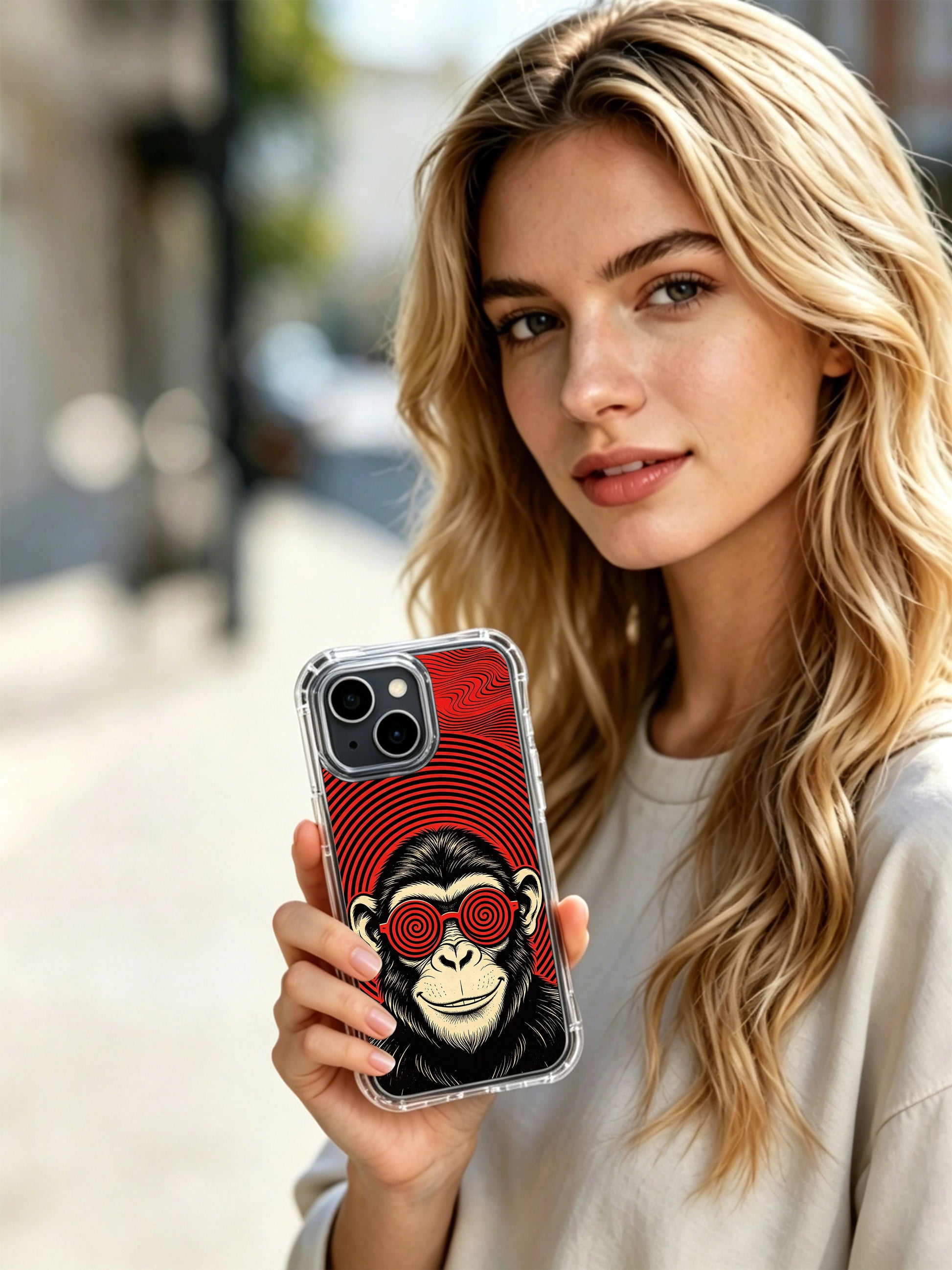 Surreal vintage gig poster animal portrait of red spiral lens cheeky prank chimp by Rufus Vale for PhoneCasing iPhone 13 Case, elegant art casing ideal for curated birthday gifts for art-loving ladies.