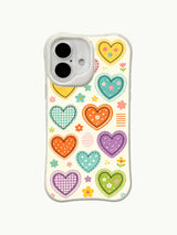 Patchwork Whimsy heart pattern on an iPhone 16 Plus case
