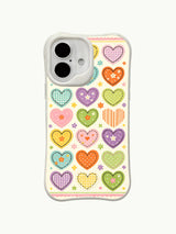 Patchwork Hearts sticker pattern on an iPhone 16 Plus case