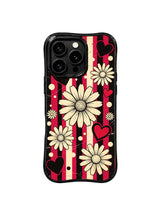 PhoneCasing iPhone 16 pro Case with full-bleed vertical distressed cherry red black stripe rhythm daisy heart dot layout full of confident nostalgic retro rock charm, Ruby Daze signature collection, MagSafe compatible wavy black protective art casing.