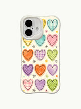 Vintage Sweetness heart pattern on an iPhone 16 Plus case