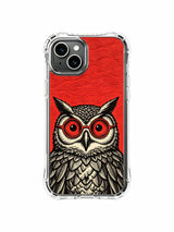 Night Reverie: A broad owl face with ear tufts reaching outward over red round lenses.