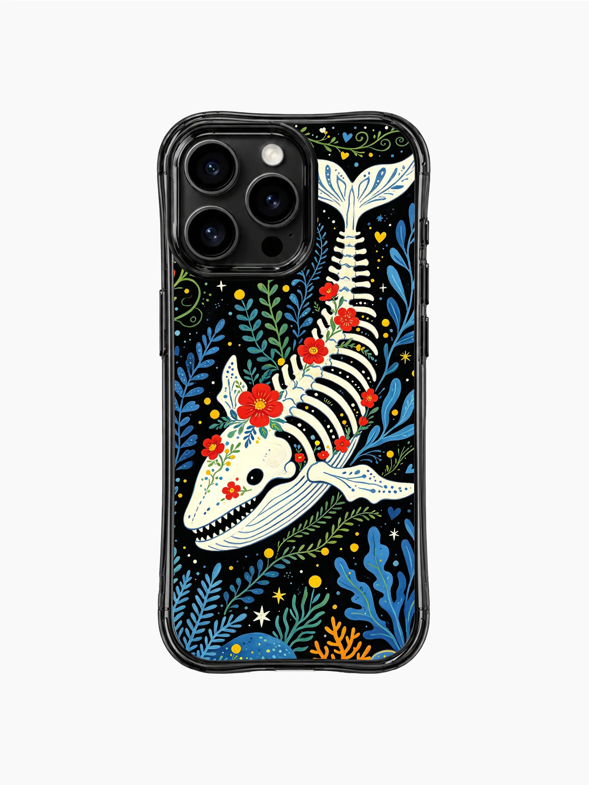 PhoneCasing iPhone 16 pro max protective case featuring a whimsical whale skull artwork. Vibrant floral print with red flowers and blue seaweed.