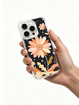 Pink Desert Bloom iPhone 15 Pro case in hand