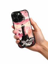 Black cat lighthouse and ghost ship iPhone 13 Pro case lifestyle image