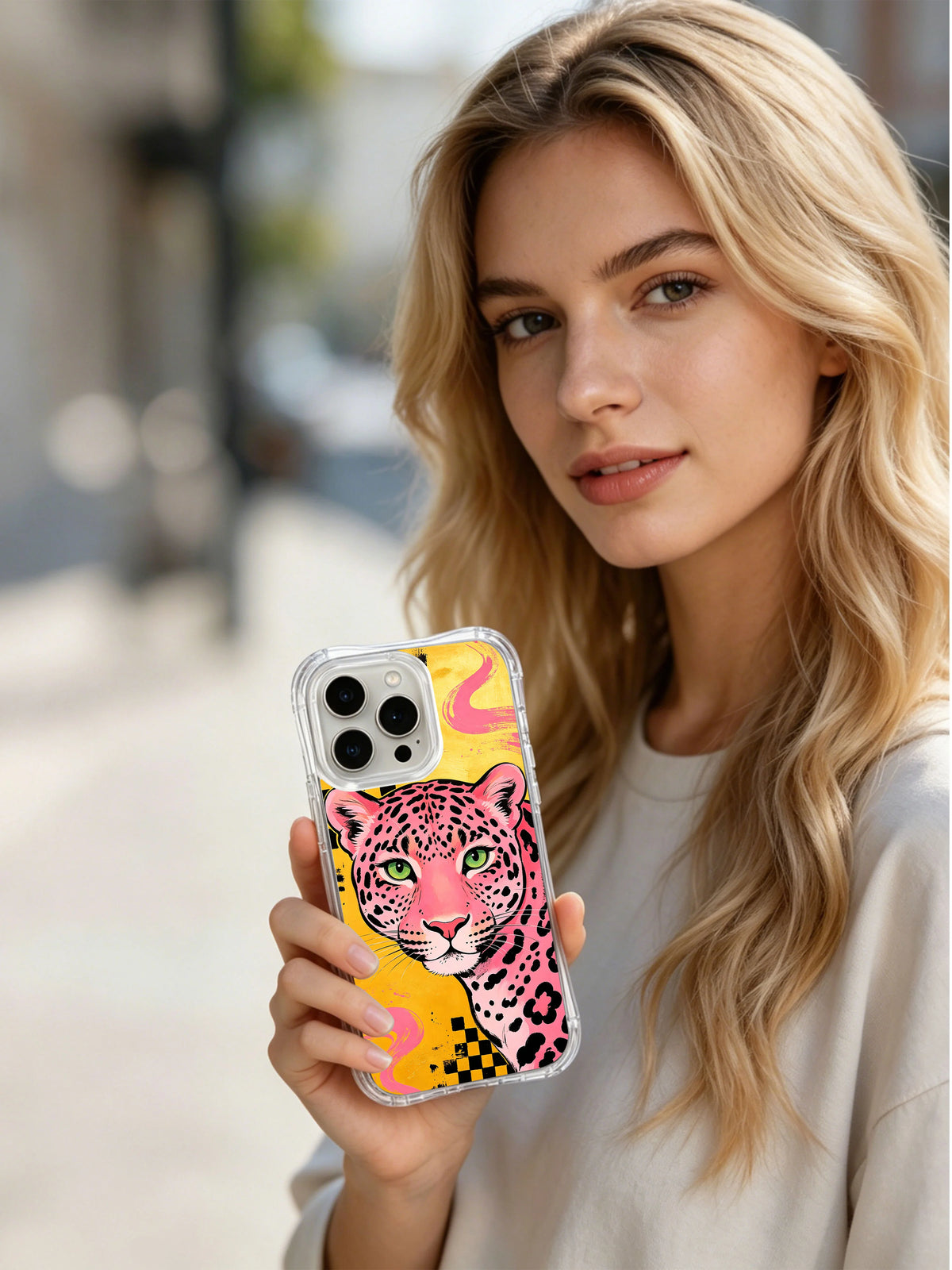 Lifestyle view of Pink Panther Wild Heart iPhone 13 Pro Max case in the checkerboard portrait pattern
