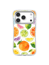 Sunny Citrus Slices: Large orange, lime, lemon and pink citrus slices mix with whole fruit and leaves.