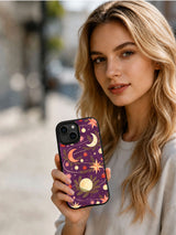 Plum Christmas Sky iPhone 15 case shown in a winter lifestyle scene