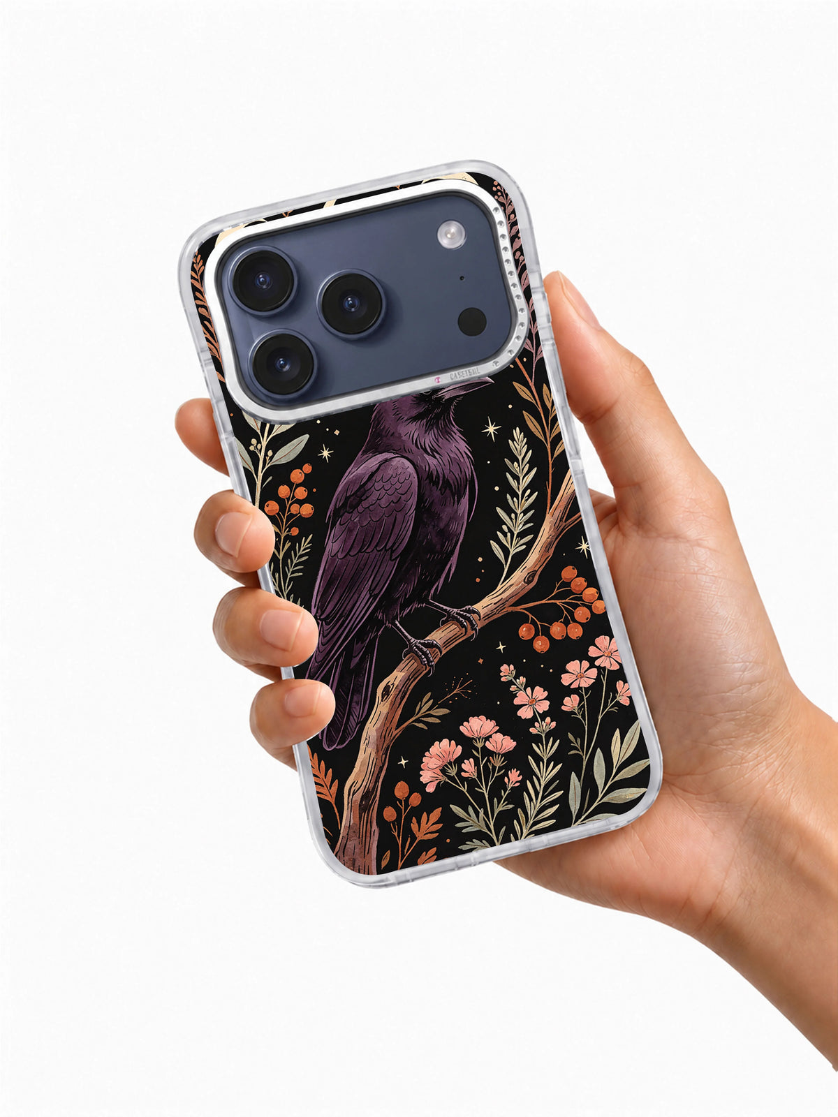 Plum Raven Herbarium iPhone case held in hand showing deep purple raven art